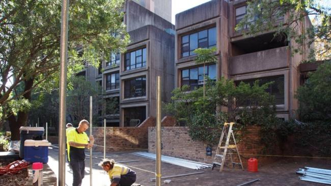 Contractors fencing off the Sirius building. Picture; Supplied