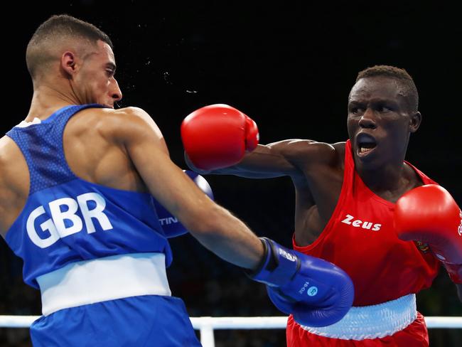 Simplice Fotsala, right, is among the Cameroon athletes who have gone missing. Picture: Dean Mouhtaropoulos/Getty Images