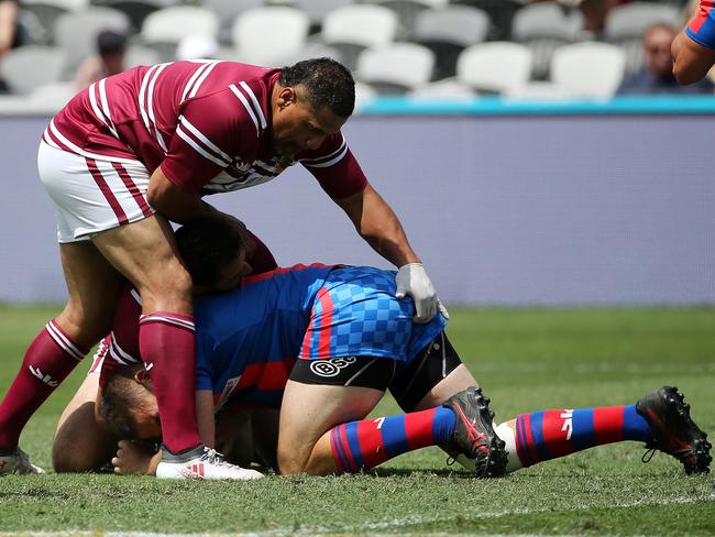 John Hopoate poking the bum hole of a Newcastle Knights player in today’s Legends of League Tournament on the Central Coast. Picture: Tim Hunter