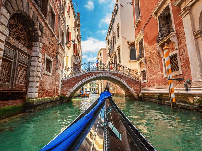 On a gondola ride through the canals.