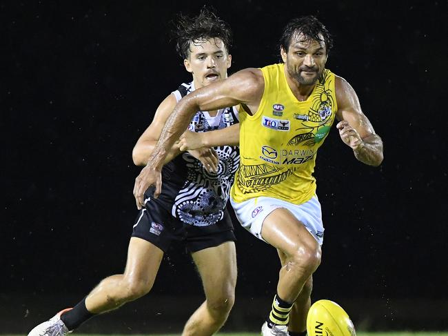 Nightcliff’s Shaun Wilson charges after the ball against Palmerston Magpies in Round seven. Picture: Felicity Elliott.