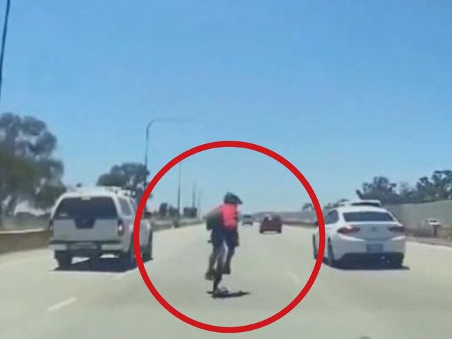 Watch: Cyclist’s high-risk antics on busy motorway