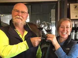 RED WIN: Ridgemill Estate's winemaker Peter McGlashan and vineyard hand Dawn Walker enjoy a glass of their award-winning Lincoln shiraz that collected a prize at the Cairns Wine Show. Picture: Contributed