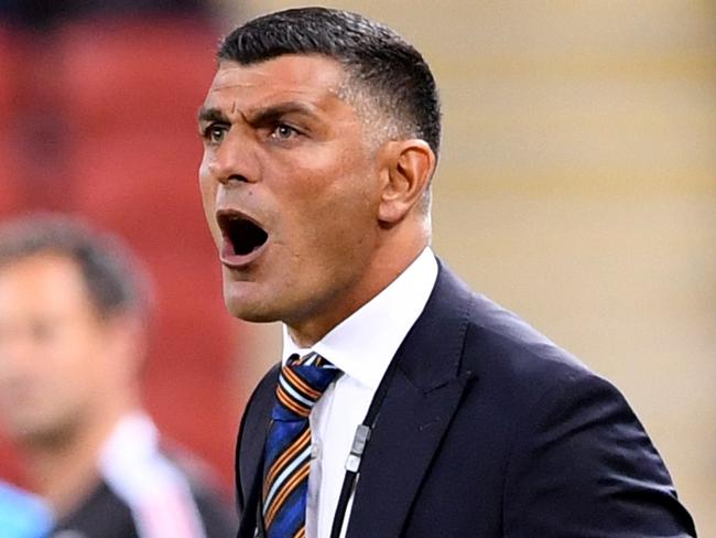 Roar coach John Aloisi is seen during the round 17 A-League match between the Brisbane Roar and Perth Glory at Suncorp Stadium in Brisbane, Thursday, January 18, 2018. . (AAP Image/Dave Hunt) NO ARCHIVING, EDITORIAL USE ONLY