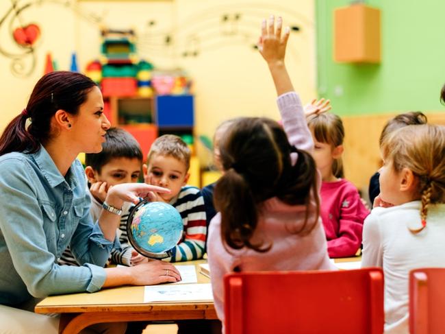 RendezView. Childcare teacher teaching her children about geography. (Pic: iStock)