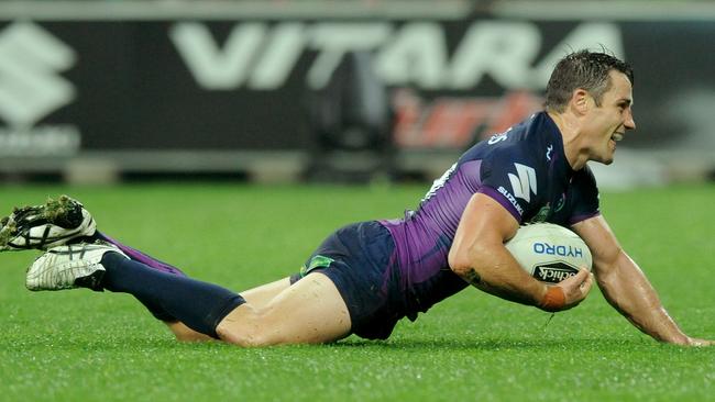 Cooper Cronk dives to score a try against Penrith. Picture: AAP