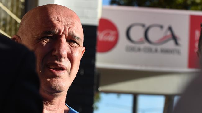 Coca-Cola worker Gino Gaddi speaks to media outside the Thebarton plant. Picture: Sam Wundke