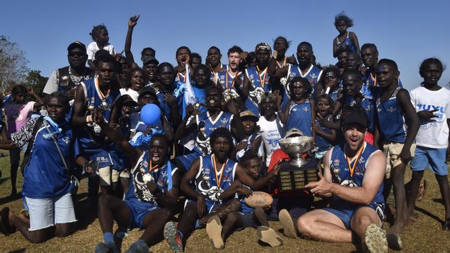 The Buffaloes following the win in the Tiwi Island Football League grand final between Tuyu Buffaloes and Pumarali Thunder. Picture: Max Hatzoglou