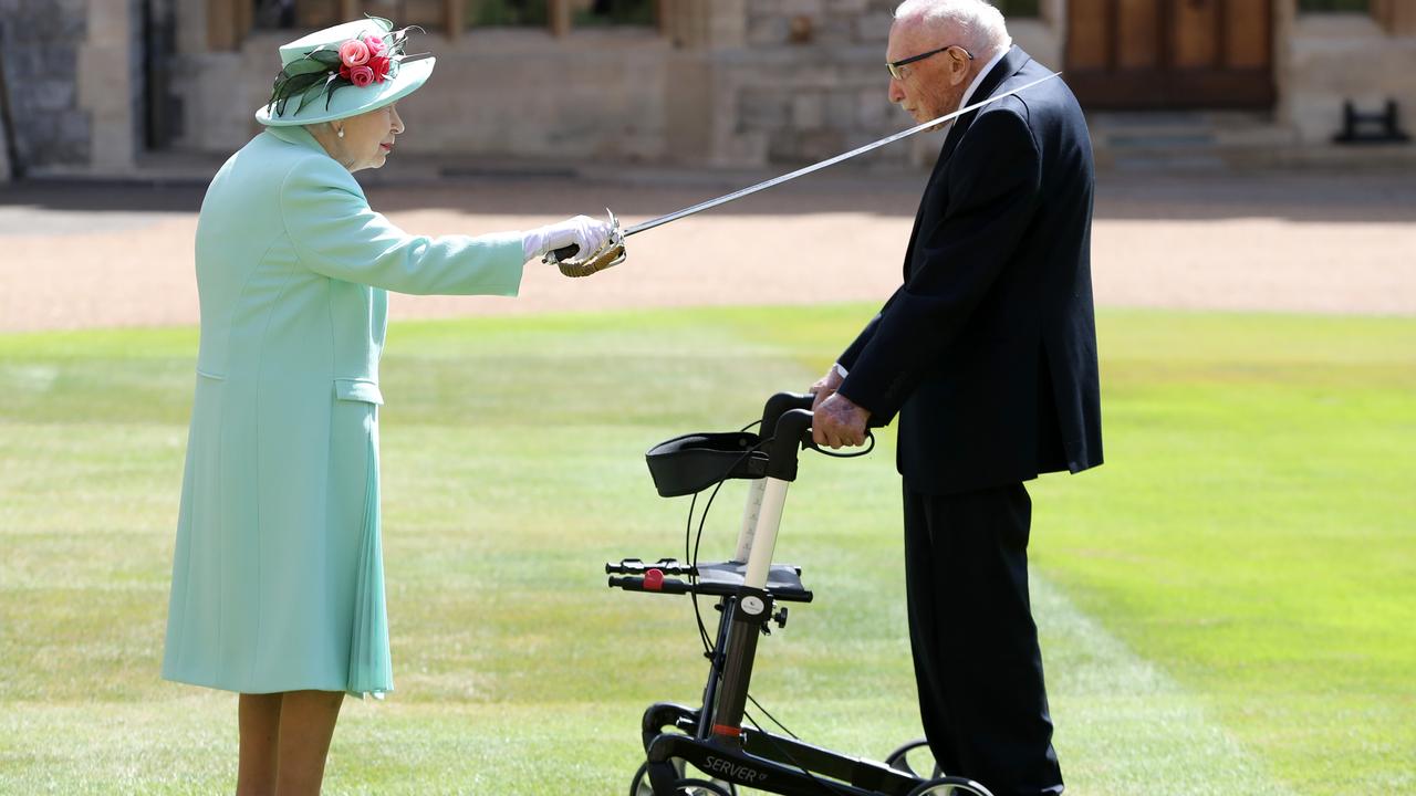 “if I kneel down, I’ll never get up again, but I’m sure it’ll go well, as she’s done it before” joked Captain Sir Thomas Moore. Photo by Chris Jackson/Getty Images