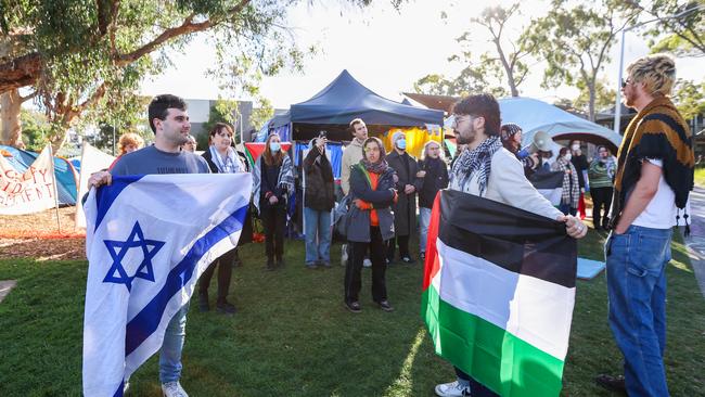 Pro-Palestine and pro-Israel supporters confront each other at the Monash University pro-Palestine encampment in May. Picture: Brendan Beckett