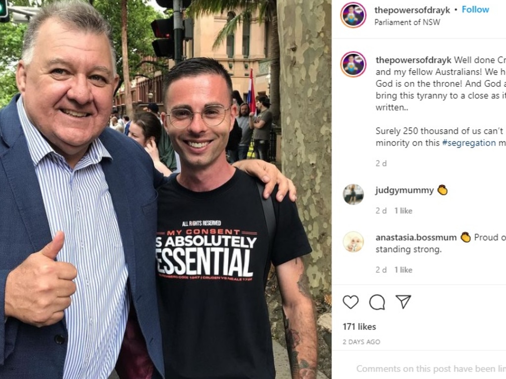 Dominic Karnaby (right) posing with MP Craig Kelly.