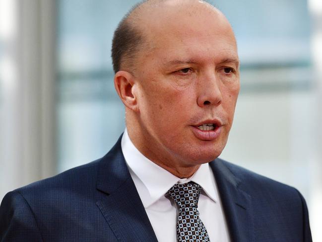 Minister for Home Affairs Peter Dutton at a press conference at Parliament House in Canberra, Thursday, March 1, 2018. (AAP Image/Mick Tsikas) NO ARCHIVING