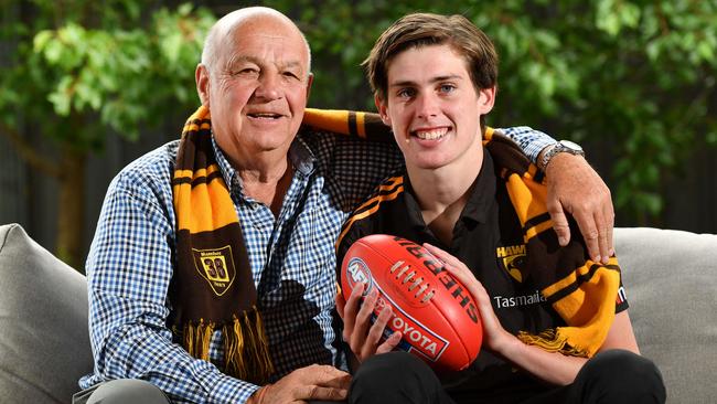 Robert Day with his Grandson Will Day pose for a photograph at home in Glenelg North, Adelaide on Friday the 29th of November 2019. West Adelaide football player Will, was drafted to the AFL club Hawthorn on Wednesday night. His grandfather Robert played at the Hawks, including the 1971 premiership. (AAP/ Keryn Stevens)