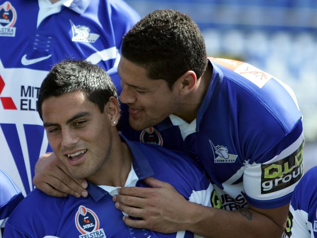 Willie Mason and Reni Maitua fool around during a team photo for the Bulldogs. Pic; Gregg Porteous