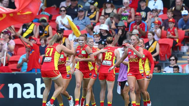 GOLD COAST, AUSTRALIA - FEBRUARY 15: Jamie Stanton of the Suns celebrates a goal during the round 2 AFLW match between the Gold Coast Suns and the Richmond Tigers at Metricon Stadium on February 15, 2020 in Gold Coast, Australia. (Photo by Chris Hyde/AFL Photos/Getty Images)