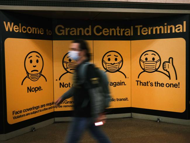 NEW YORK, NEW YORK - OCTOBER 21: A display at Grand Central Terminal shows how to wear a face mask on October 21, 2020 in New York City. Recent data from John Hopkins University shows that the U.S. recorded 60,315 positive COVID-19 cases across the United States on Tuesday. The U.S. has recorded at least 220,000 COVID-19 deaths, the highest death toll in the world.   Spencer Platt/Getty Images/AFP == FOR NEWSPAPERS, INTERNET, TELCOS & TELEVISION USE ONLY ==