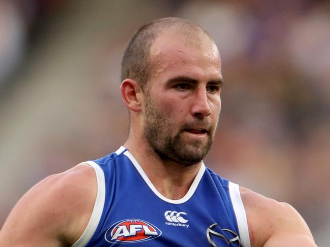 Ben Cunnington of the Kangaroos kicks the ball during the Round 19 AFL match between the West Coast Eagles and the North Melbourne Kangaroos at Optus Stadium in Perth, Saturday, July 27, 2019. (AAP Image/Richard Wainwright) NO ARCHIVING, EDITORIAL USE ONLY