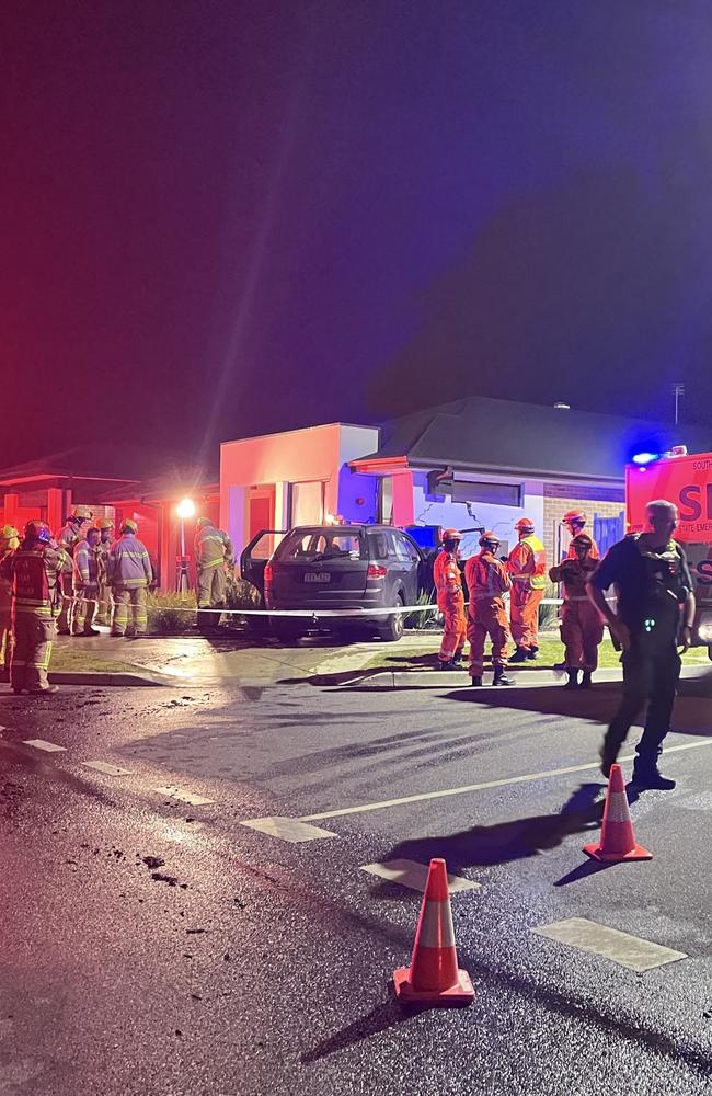 Emergency services at the scene of a car crash into an Armstrong Creek home. Picture: supplied.