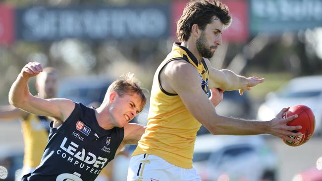 Glenelg defender and captain Max Proud boots the Tigers forward in their strong win against South Adelaide. Picture: SANFL Image/David Mariuz