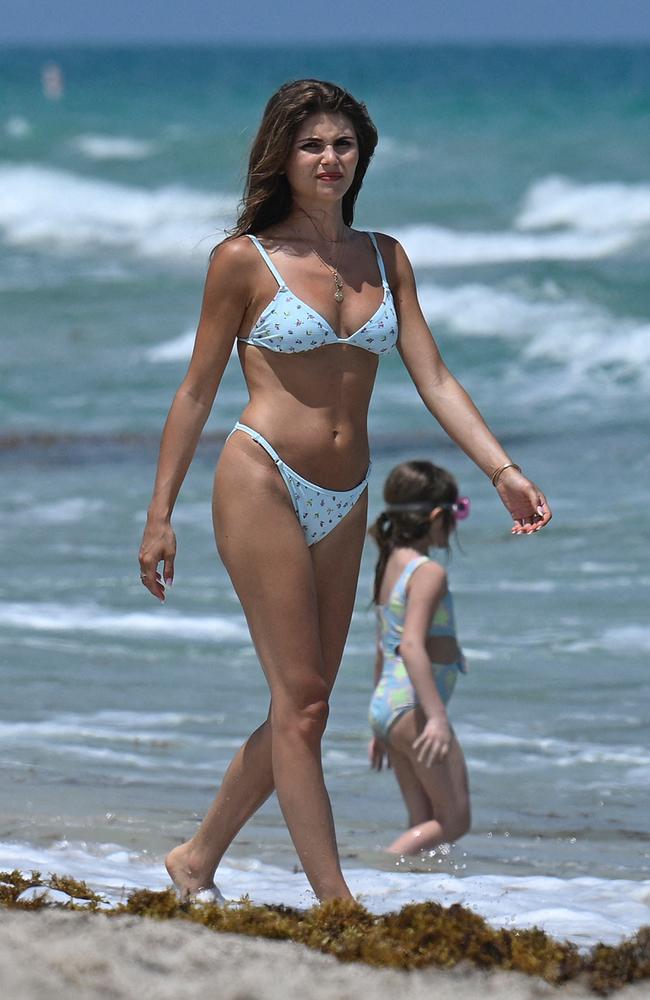 Olivia Jade Giannulli shows off her tanned and toned figure as she hits Miami Beach in a skimpy baby blue bikini on April 23. Picture: Backgrid/MEGA