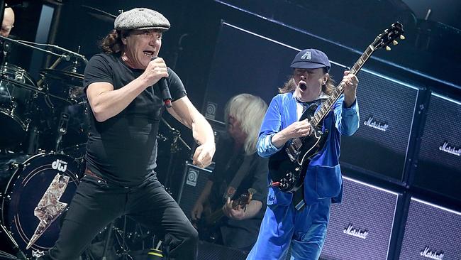 Brian Johnson (left) and Angus Young perform in concert with AC/DC. Picture: Gary Miller/Getty Images