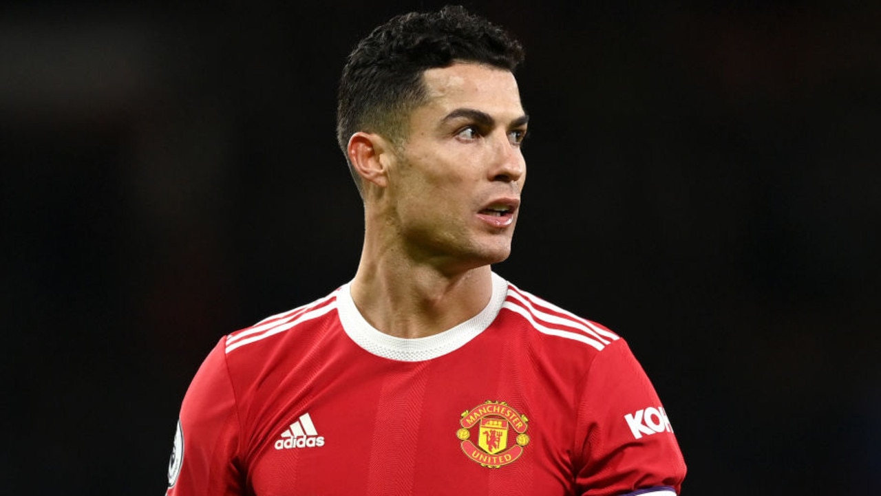 MANCHESTER, ENGLAND - JANUARY 03: Cristiano Ronaldo of Manchester United reacts wearing the captains armband during the Premier League match between Manchester United and Wolverhampton Wanderers at Old Trafford on January 03, 2022 in Manchester, England. (Photo by Gareth Copley/Getty Images)