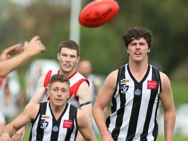 Narre Warren and Olinda Ferny Creek players. Picture: Stuart Milligan