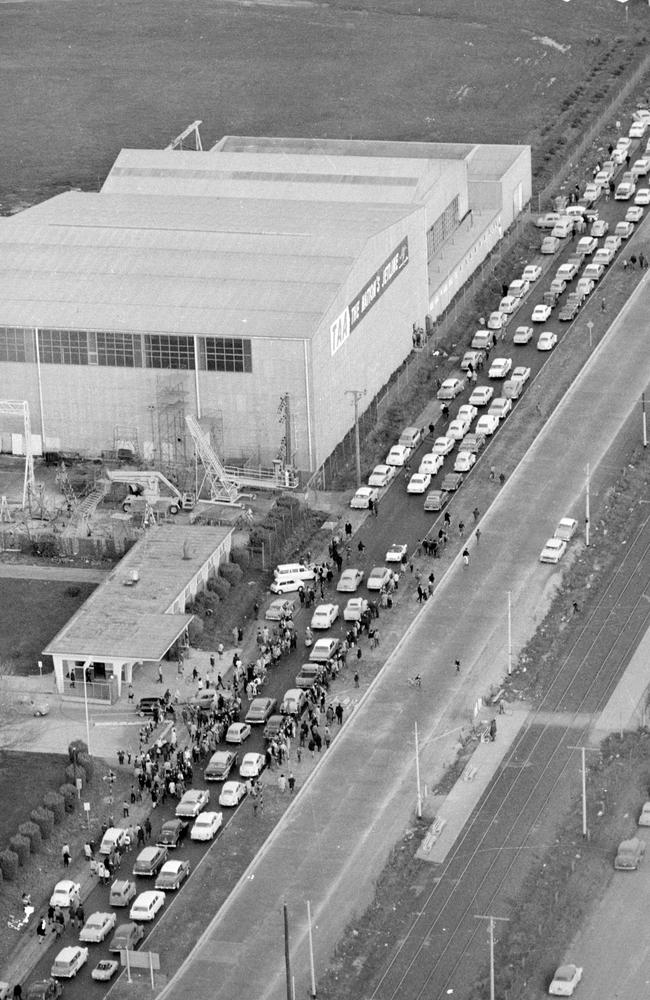 June 14, 1964: The crowds line the roads near Essendon Airport where the band touched down. Picture: Herald Sun Image Library