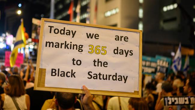 Hundreds of protesters calling for a ceasefire and the release of hostages held by Hamas gathered in Tel Aviv last month. Picture: Getty Images