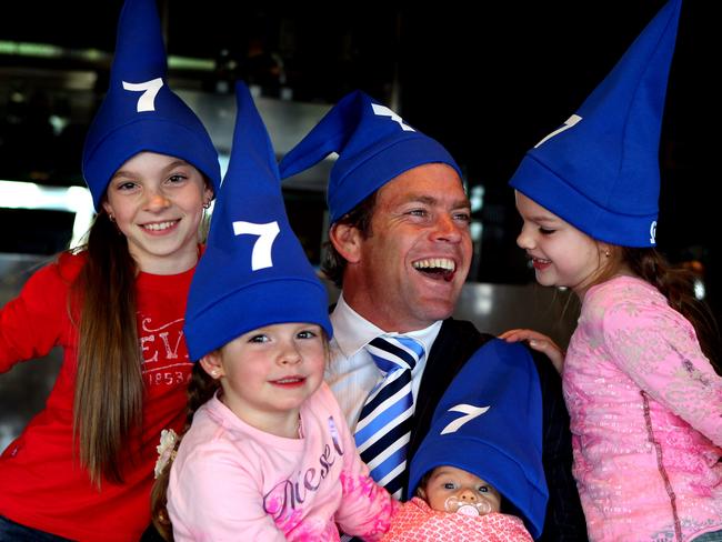 Canterbury Bulldogs player Brett ‘Noddy’ Kimmorley with his children Ivy (8), Ava (3), Mia (7) and Maddie (9) wearing Noddy hats during a press conference at which he announced his retirement from the game.