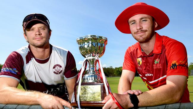 Alex Bleakley (Palmerston) and Isaac Conway (Waratah) with the Darwin Premier Grade premiership trophy. Picture: Katrina Bridgeford