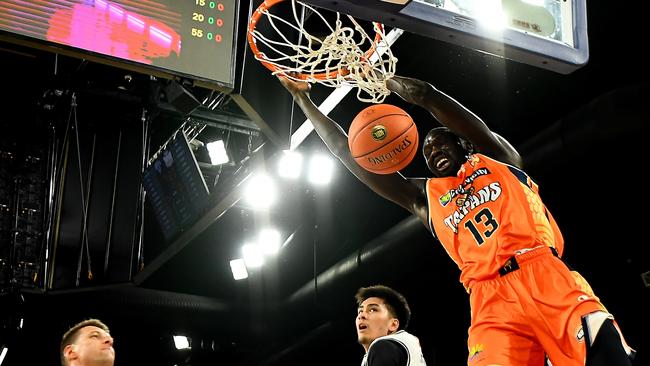 Majok Deng of the Taipans dunks the ball. (Photo by Steve Bell/Getty Images)