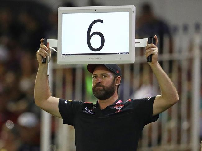 MELBOURNE, AUSTRALIA - FEBRUARY 28: A Bombers official holds one of the electronic bench screens during the 2019 JLT Community Series AFL match between the Carlton Blues and the Essendon Bombers at Ikon Park on February 28, 2019 in Melbourne, Australia. (Photo by Scott Barbour/Getty Images)