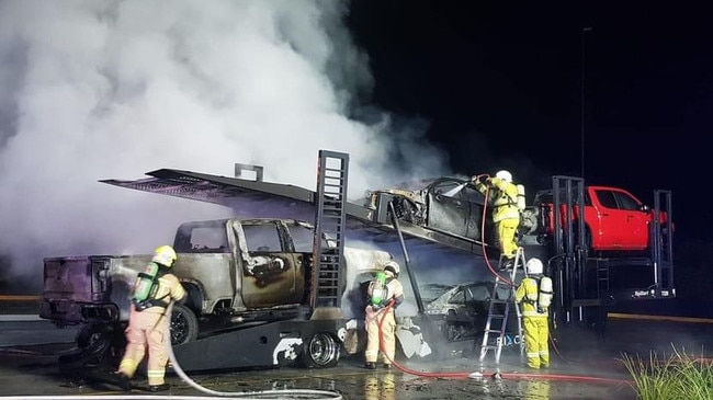 Twenty six firefighters fought to put out flames engulfing a truck trailer near the Hume Highway. Picture: NSW RFS