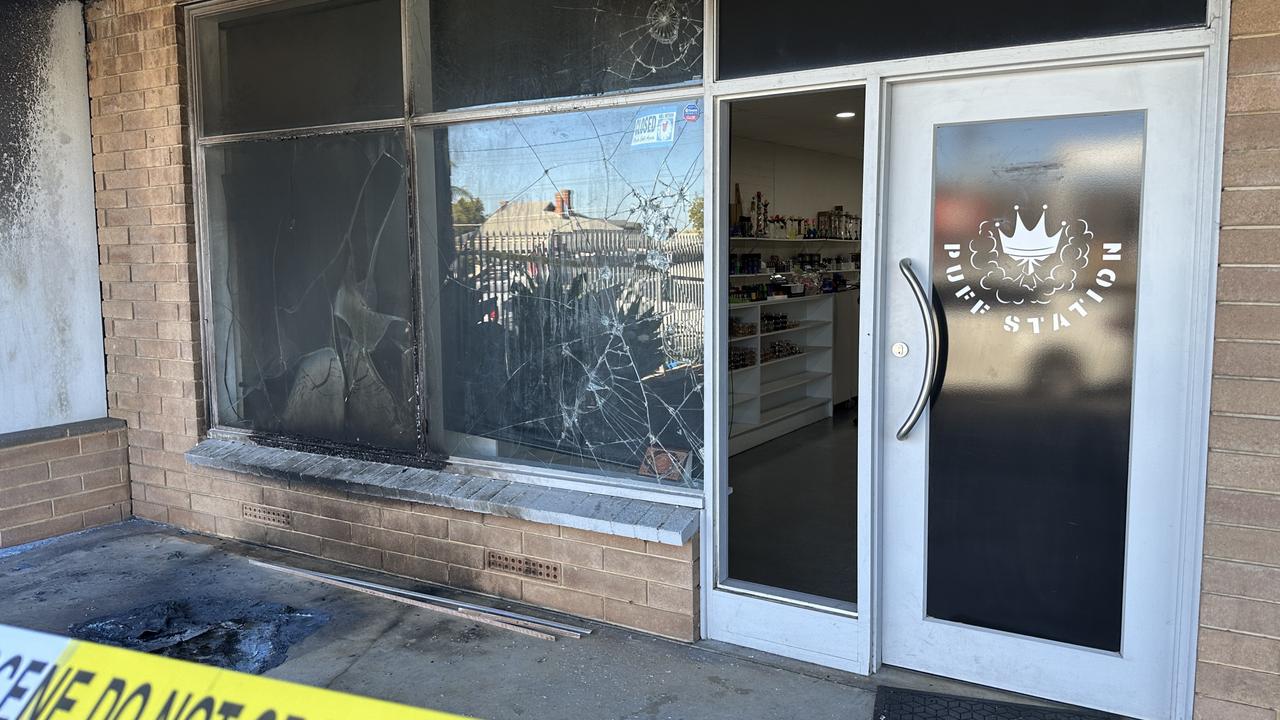 The blackened and broken windows of Puff Station. Picture: Sam Lowe