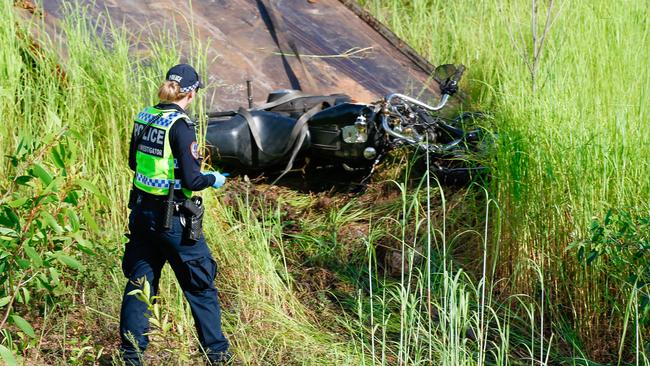 NT Police investigators at the scene of a fatal single vehicle motorbike accident on Jenkins Rd in Darwin's rural area on February 12. Picture: Glenn Campbell