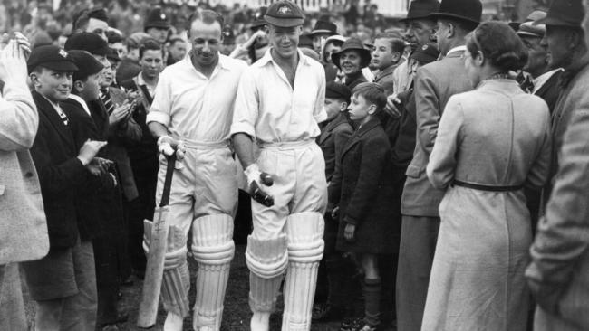 Don Bradman, left, and Bill Brown walking out to bat at Trent Bridge in 1938