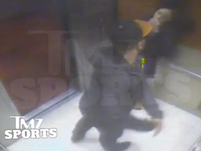 In this still image taken from a hotel security video released by TMZ Sports, sacked Baltimore Ravens running back Ray Rice punches his fiancee, Janay Palmer.