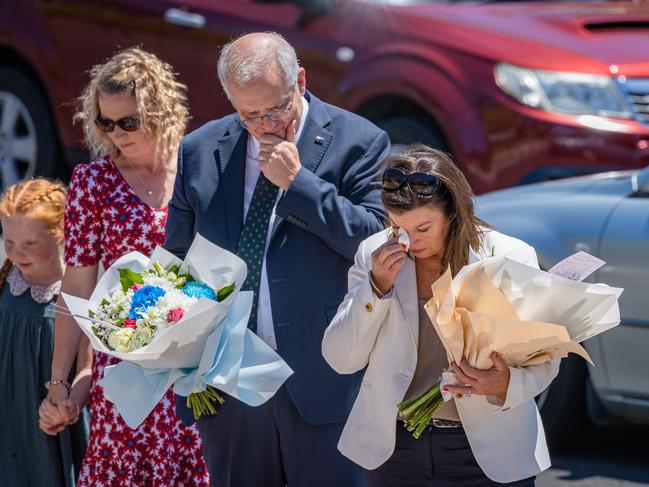 Prime Minister Scott Morrison and his wife, Jenny, lay flowers at the school. Picture: Jason Edwards