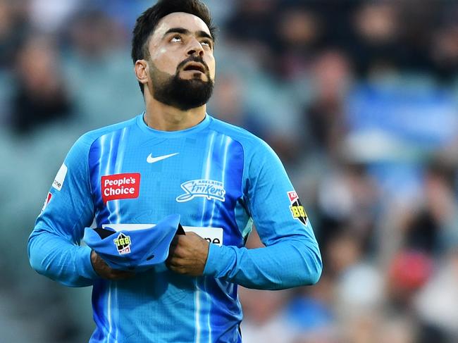 ADELAIDE, AUSTRALIA - JANUARY 05: Rashid Khan of the Strikers after bowling his last ball during the Men's Big Bash League match between the Adelaide Strikers and the Hobart Hurricanes at Adelaide Oval, on January 05, 2023, in Adelaide, Australia. (Photo by Mark Brake/Getty Images)