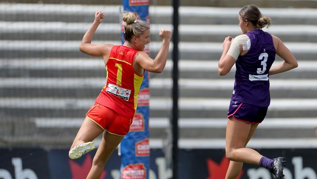 Paige Parker of the Suns celebrates after kicking a goal during the AFLW semi final 4 match between the Fremantle Dockers and Gold Coast Suns at Fremantle Oval in Perth, Saturday, March 21, 2020. (AAP Image/Richard Wainwright)