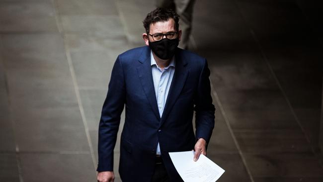 Victorian Premier Daniel Andrews walks into the daily briefing on September 5.