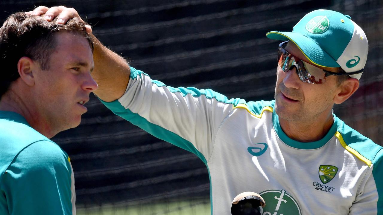 Langer gives tips to the Marcus Harris during a training session at Adelaide Oval. Picture: AFP