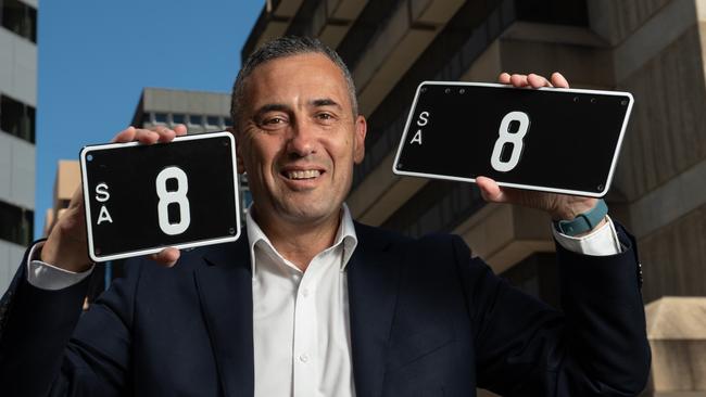 Transport Minister Tom Koutsantonis with the number eight plates. Picture: Naomi Jellicoe