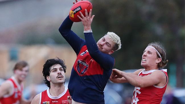 Portarlington's Teia Miles marks. BFNL game between Portarlington and Ocean Grove. Picture: Alan Barber