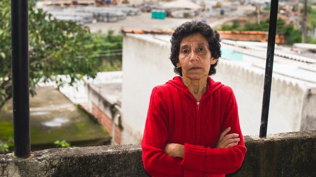 Maria da Penha pictured on her porch overlooking the Olympic Park complex with just over a year to go until the Rio Games begin. Picture: Ariel Guevara