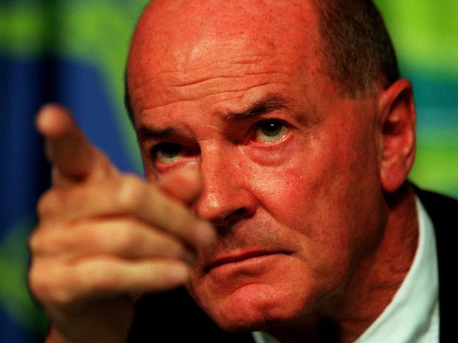 Kevan Gosper, pictured in 1999 on the defensive during a press conference about the Sydney Olympics when he was the IOC vice president., Picture: Brett Faulkner