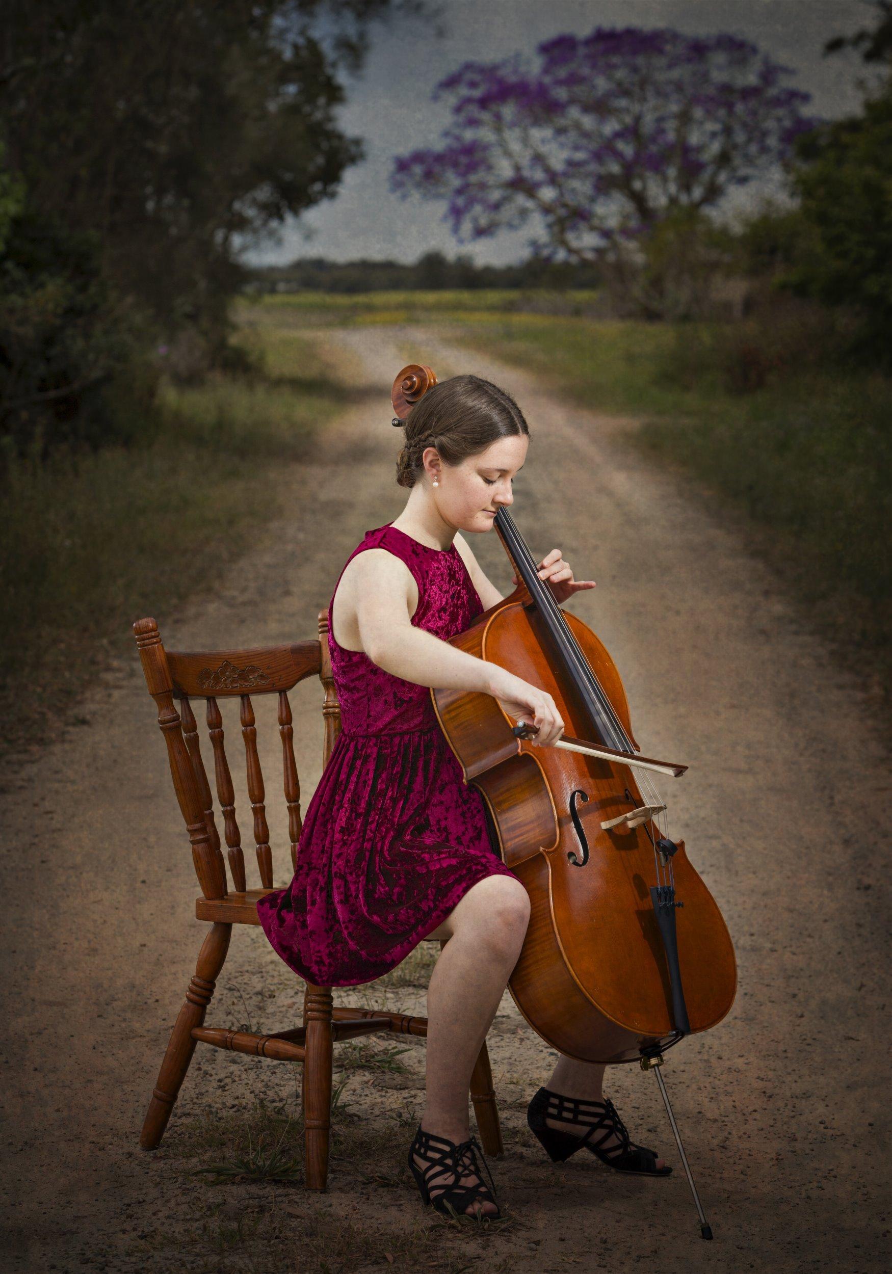 Breanna Ryan of Harwood plays a cello on the dirt road outside her house - heading to Sydney later in the month to perform as part of the orchestra at the Schools Spectacular.Photo Adam Hourigan / The Daily Examiner. Picture: Adam Hourigan