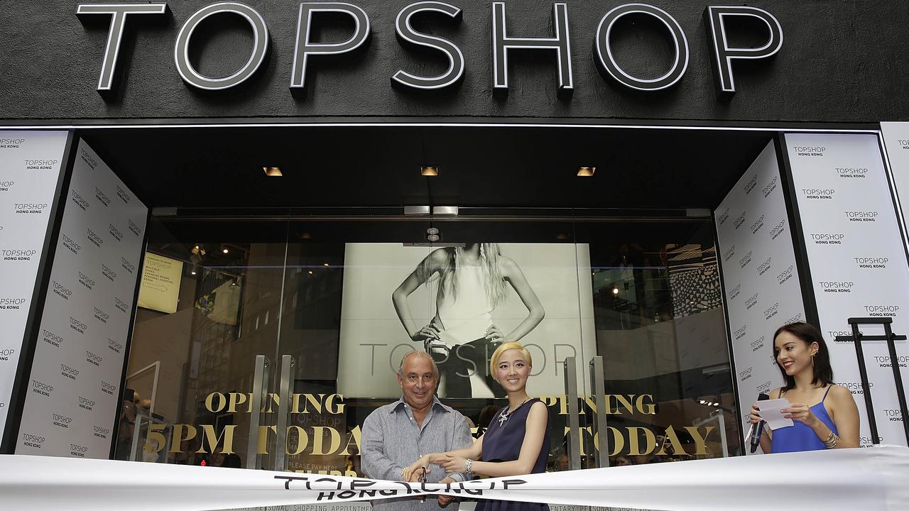 Sir Philip Green made Topshop world famous, here opening a store in Hong Kong, but also chaired its parent company as the chain sunk to a $1bn loss. Picture: Jessica Hromas/Getty