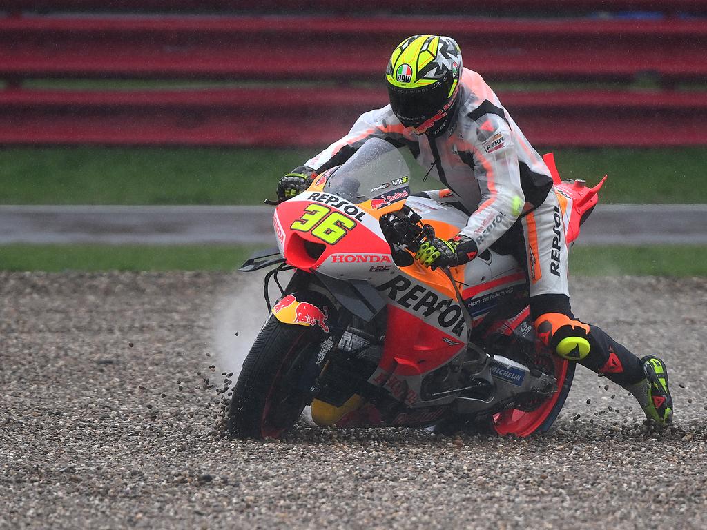 NORTHAMPTON, ENGLAND - AUGUST 05:  Joan Mir of Spain runs into the gravel during the MotoGP of Great Britain - First Qualifying at Silverstone Circuit on August 05, 2023 in Northampton, England. (Photo by Clive Mason/Getty Images)